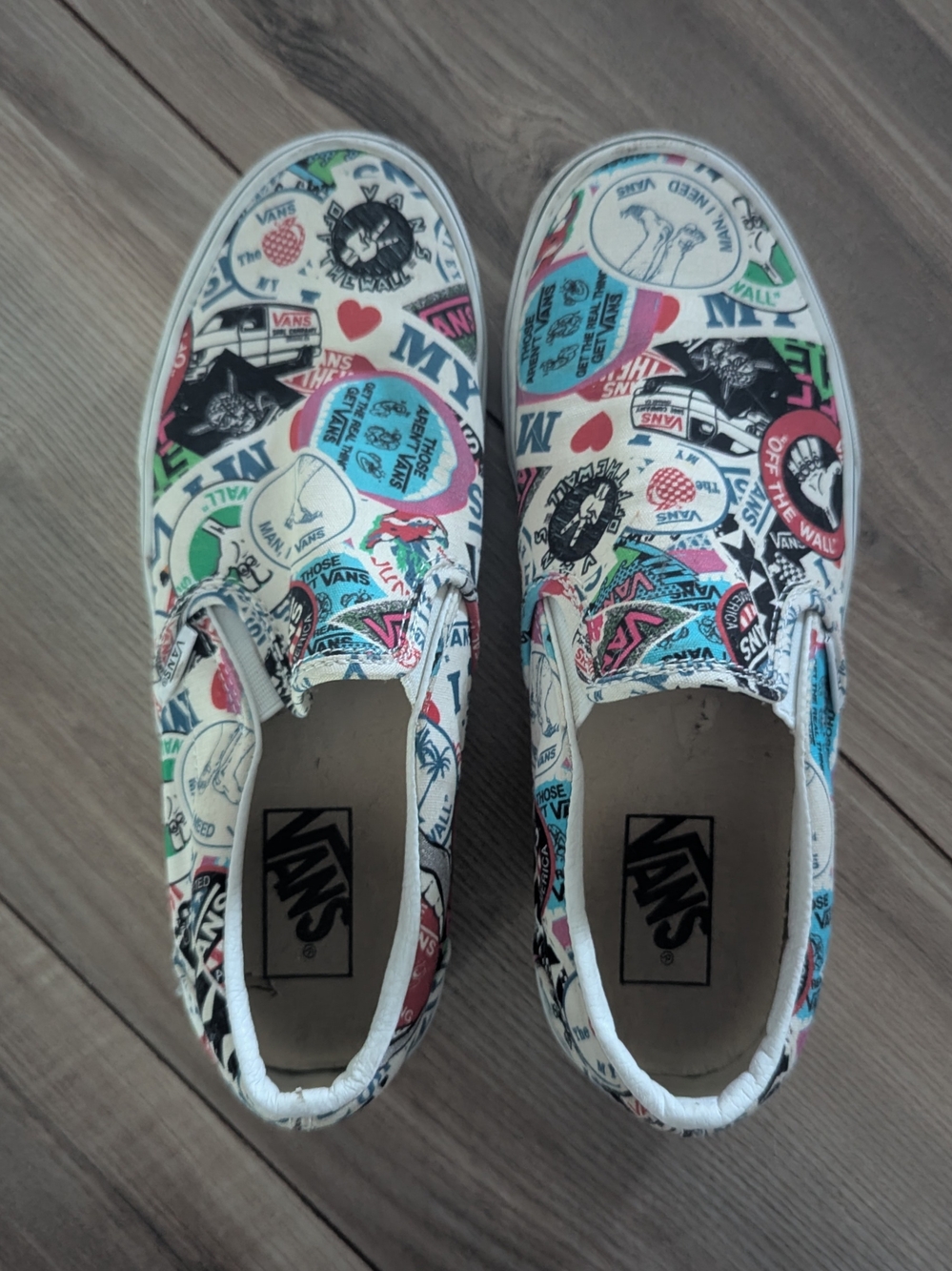 Vans White Slip-On Loafers with Multicolor Badge Graphics